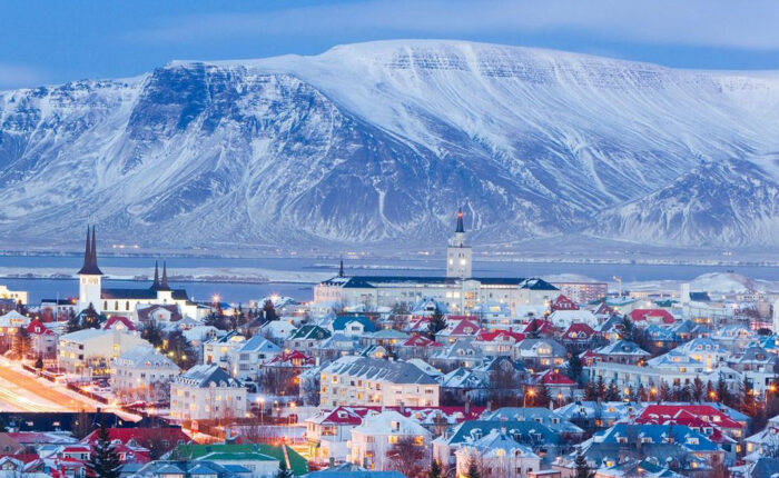 a town with a mountain in the background
