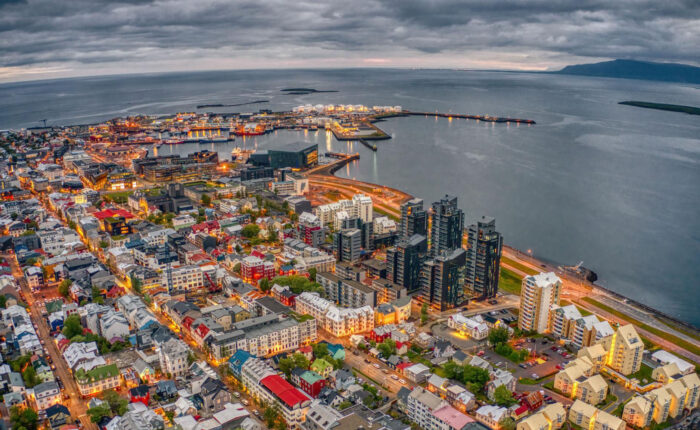 Reykjavik cruise port with ship docked and colorful city skyline