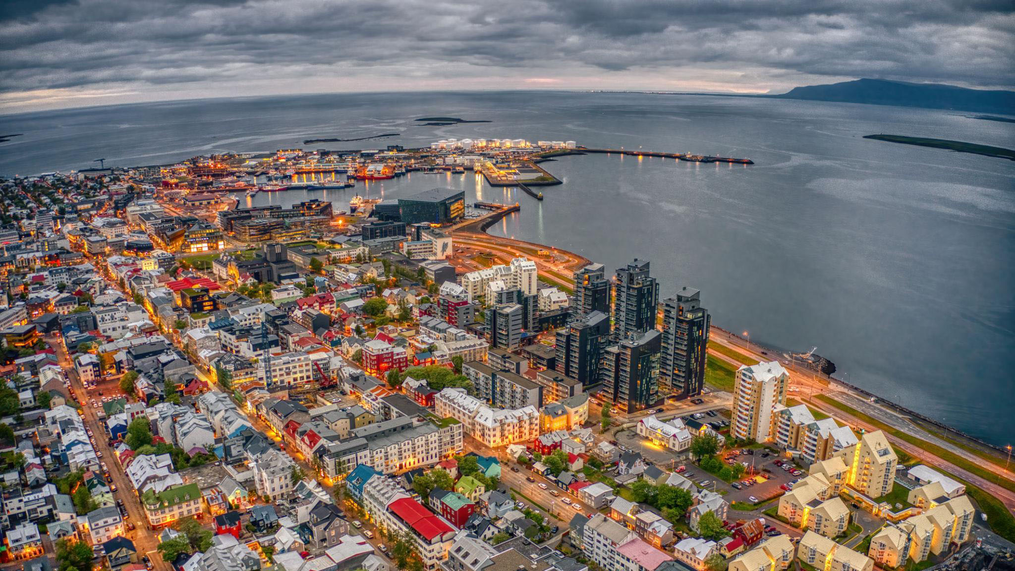 Reykjavik cruise port with ship docked and colorful city skyline