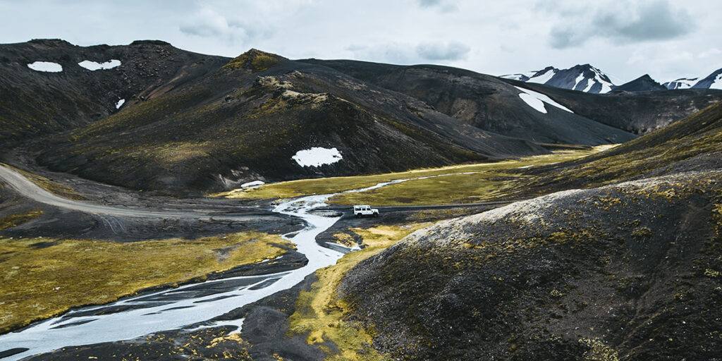 Super jeep driving through Icelandic landscape on private tour